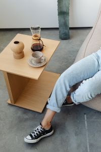 Kaboompics - Chemex Coffee and Jeans-Clad Legs by a Table