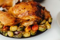 Kaboompics - Close-Up of Golden Roast Turkey and Brussels Sprouts on Platter