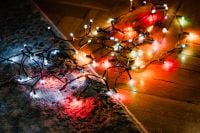 Kaboompics - Colorful Christmas Lights on Wooden Floor in Warm Holiday Glow