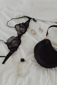 Kaboompics - Black Lace Bra and Panties with Perfume and Leather Bag