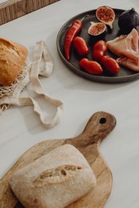 Kaboompics - Rustic Bread with Prosciutto, Cherry Tomatoes and Figs