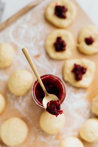 Kaboompics - Shallow-Focus Cherry Jam Spoon and Paczki Dough