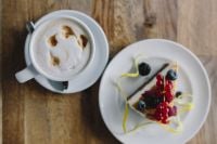 Kaboompics - Cup of coffee and berry cheesecake