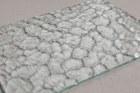 Kaboompics - Angled Ornamental Glass Sheet with Repeating Irregular Texture