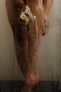 Kaboompics - Woman Standing Behind a Steamy Shower Door