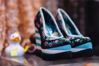 Kaboompics - Floral High Heels with Striped Soles and a Miniature Duck