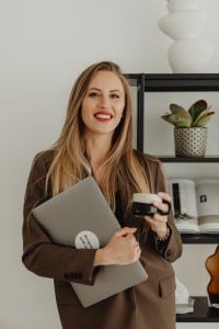 Kaboompics - Lifestyle Branding Portrait of Interior Stylist With Coffee and Laptop