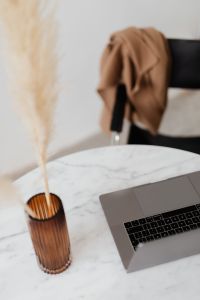 Kaboompics - MacBook Pro 15 laptop and iPhone 11 Pro on a marble table