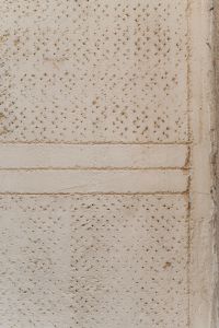 Kaboompics - Vertical Speckled Cream Stone Wall