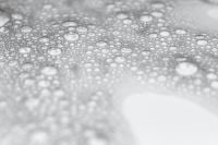 Kaboompics - Soft-Focus Liquid Bubble Cluster on a Pale Cosmetic Texture Background