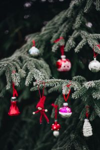 Kaboompics - Playful Christmas Ornaments Hanging on Evergreen Branches