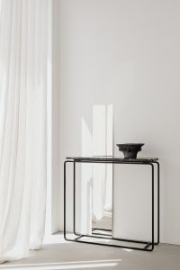 Kaboompics - Minimal Black Marble Console In Bright Interior