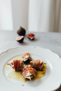 Kaboompics - Close-Up Prosciutto-Wrapped Figs With Goat Cheese