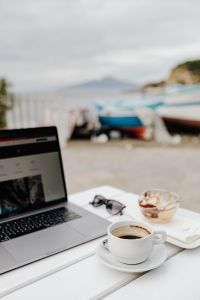 Kaboompics - Laptop, Cappuccino and Tiramisu Overlooking Boats
