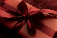 Kaboompics - Vertical Red Gift Box with Burgundy Ribbon