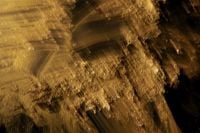 Kaboompics - Dark Gold Abstract Motion Blur with Layered Brown Streaks, Textured Background
