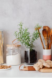 Kaboompics - Neutral Kitchen Wall Copy Space above Rosemary and Pantry Storage Jars