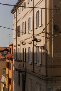 Kaboompics - Italian Apartment Facade with Shutters, Street Lamp and Overhead Wires