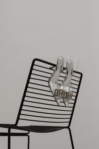 Kaboompics - Nude Clear Stiletto with a Spiral Ankle Strap and Curtain Background