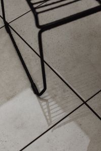 Kaboompics - Wet Patio Tiles and Metal Chair After Rain