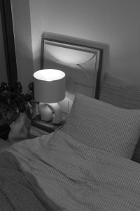 Kaboompics - Close-Up Bedside Lamp in a Monochrome Bedroom