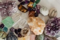 Kaboompics - Close-Up of Amethyst Clusters, Quartz Points and Polished Tiger's Eye Gemstones