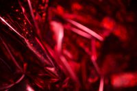 Kaboompics - Red Holographic Paper Backgrounds