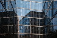 Kaboompics - Reflective Glass Office Buildings in Urban Courtyard