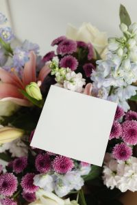 Kaboompics - Tilted Blank Card in Pastel Bouquet with Lilies and Purple Chrysanthemums