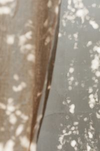 Kaboompics - Abstract Beige Curtain Blur with Sunlit Background