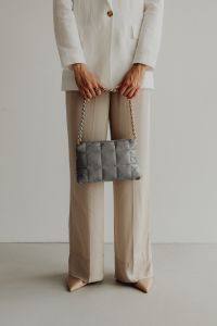 Kaboompics - Full Length Neutral Suit with Gray Quilted Chain Strap Bag