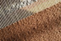 Kaboompics - Diagonal Brown Woven Fabric with White Threads