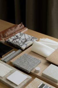 Kaboompics - Material Texture Flat Lay with Veined Marble, Granite, Wood and White Fabric