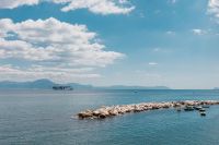 Kaboompics - Wide Naples Bay View With Mount Vesuvius Beyond the Rocky Shore