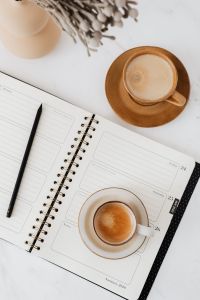 Kaboompics - Coffee - Weekly Planner & Vase on Marble