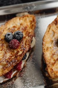 Kaboompics - Close-Up French Toast with Raspberries and Blueberries