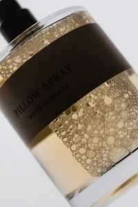 Kaboompics - Cosmetic Spray Bottle With Gold Liquid