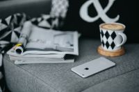 Kaboompics - Selective Focus Coffee Break Still Life with Smartphone and Magazines