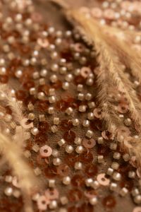 Kaboompics - Copper Beaded Textile Detail