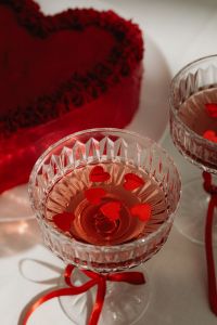 Kaboompics - Heart-Shaped Cake with Crystal Glasses in Warm Light