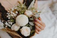 Kaboompics - Woman Holding a Pastel Rose Bouquet in Black Lace Lingerie