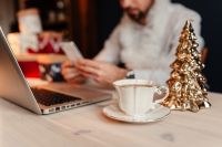 Kaboompics - Christmas Desk Decor with Gold Tree, Coffee Cup and Laptop