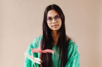 Kaboompics - A Beautiful Young Mixed Race Girl with Anthurium Flower