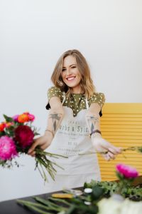 Kaboompics - Florist Holding a Bouquet and Pruning Shears