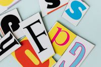 Kaboompics - Colorful Letter Cutouts with Copy Space on Blue
