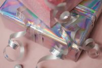 Kaboompics - Holographic Christmas Gift Box with Silver Ribbon