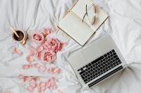 Kaboompics - Laptop Home Office Flat Lay with Pink Roses, Coffee and Glasses