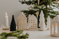 Kaboompics - Christmas Village with Tree Figurines and Lantern