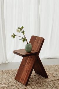 Kaboompics - Blooming Flower in Vase on Wooden Chair - A Charming Still Life Collection