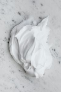 Kaboompics - White Cream Texture Close-Up on Light Marble Background